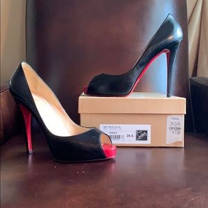 Christian Louboutin black open toe platform pumps